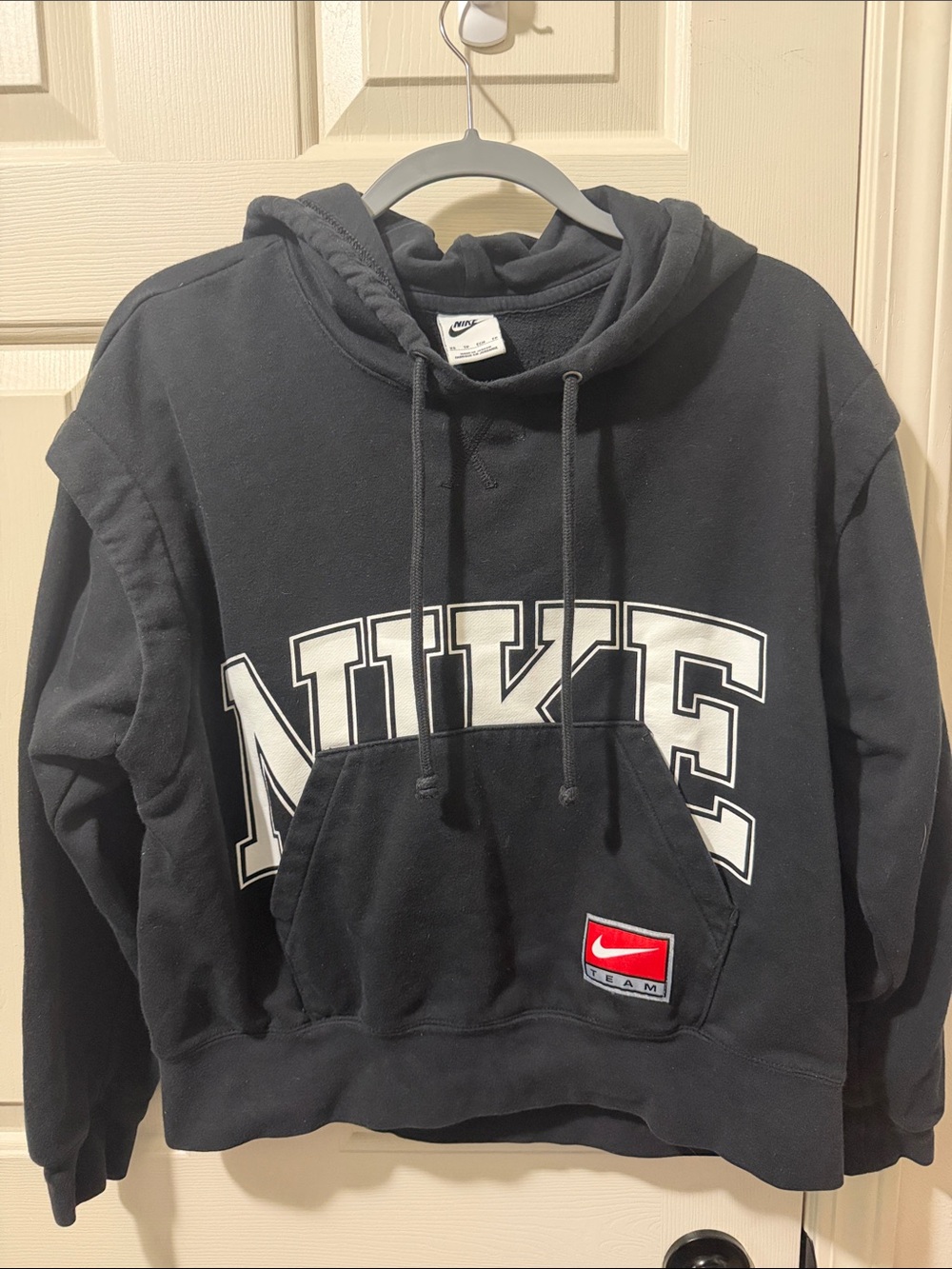 Nike Black Crewneck Hoodie with White Logo and Red Patch
